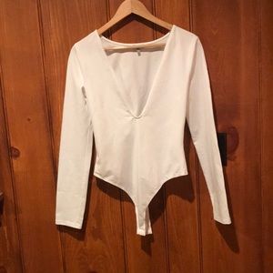 Low cut off white body suit from Tobi